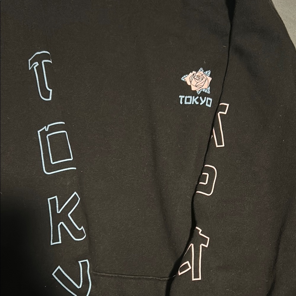 Black Sweater with Blue and Pink Accents